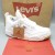 Levi's x Air Jordan 4 Retro 'White Denim'